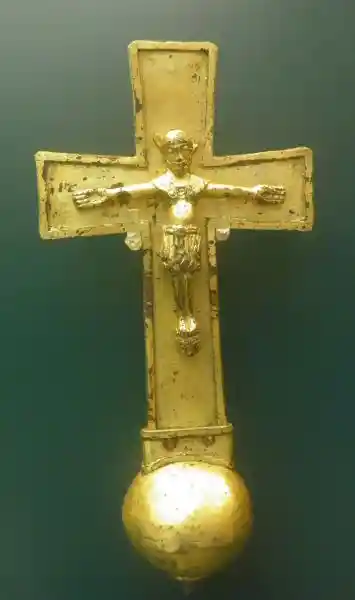 Crucifix on top of a sphere